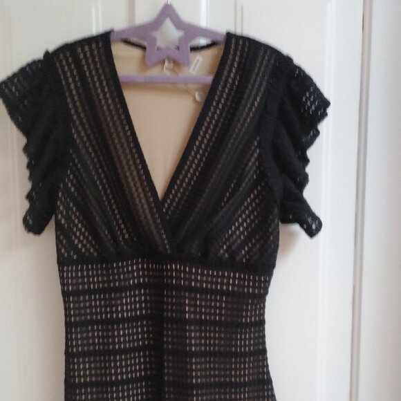 Black Lace Bodycon Dress with Ruffled Sleeves and hem - Picture 5 of 10
